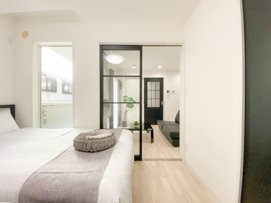 Residential Hotel Glitter Usjまで1駅5分 Osaka Cameră foto
