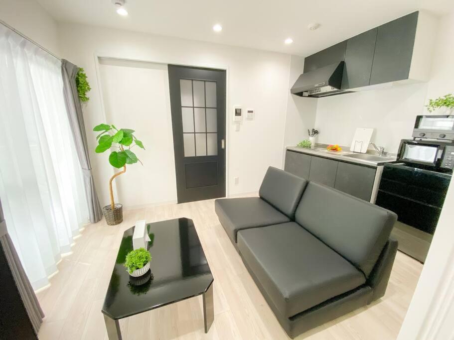 Residential Hotel Glitter Usjまで1駅5分 Osaka Cameră foto