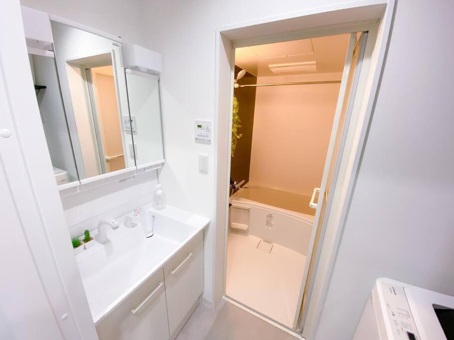Residential Hotel Glitter Usjまで1駅5分 Osaka Cameră foto