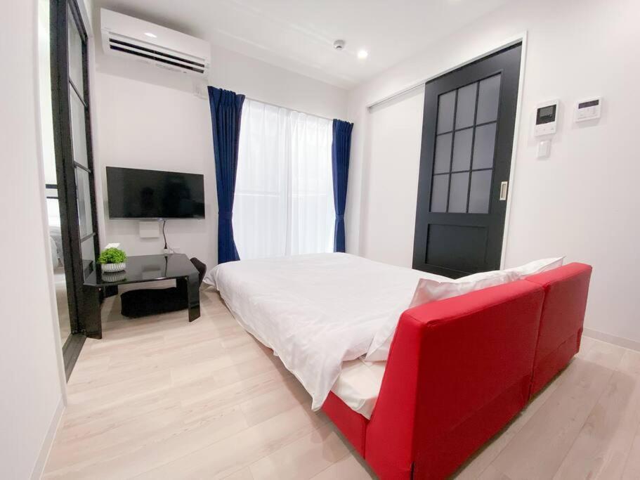 Residential Hotel Glitter Usjまで1駅5分 Osaka Cameră foto