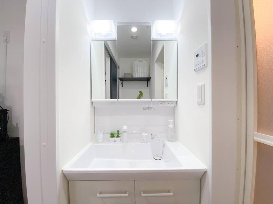 Residential Hotel Glitter Usjまで1駅5分 Osaka Cameră foto