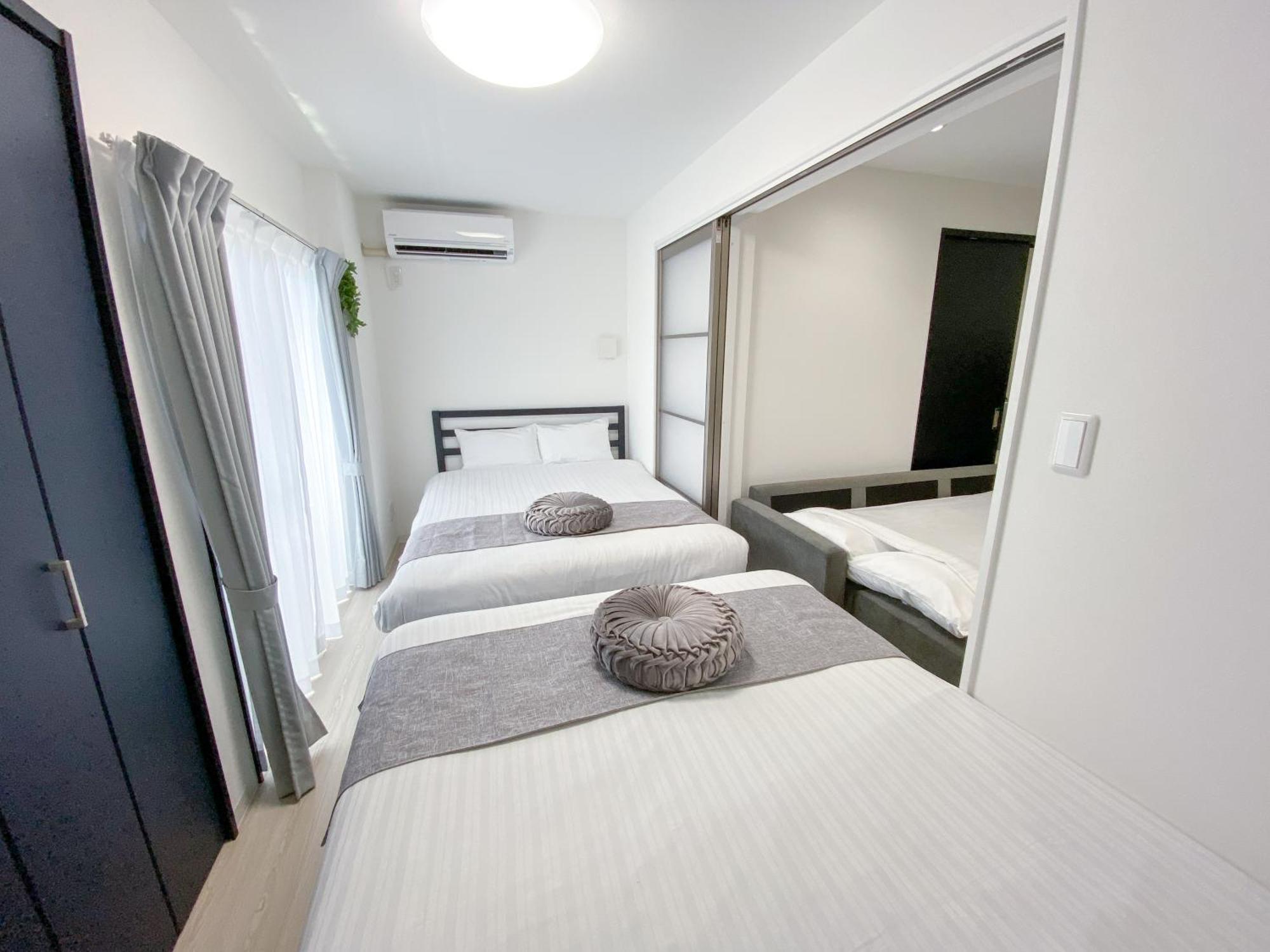 Residential Hotel Glitter Usjまで1駅5分 Osaka Cameră foto