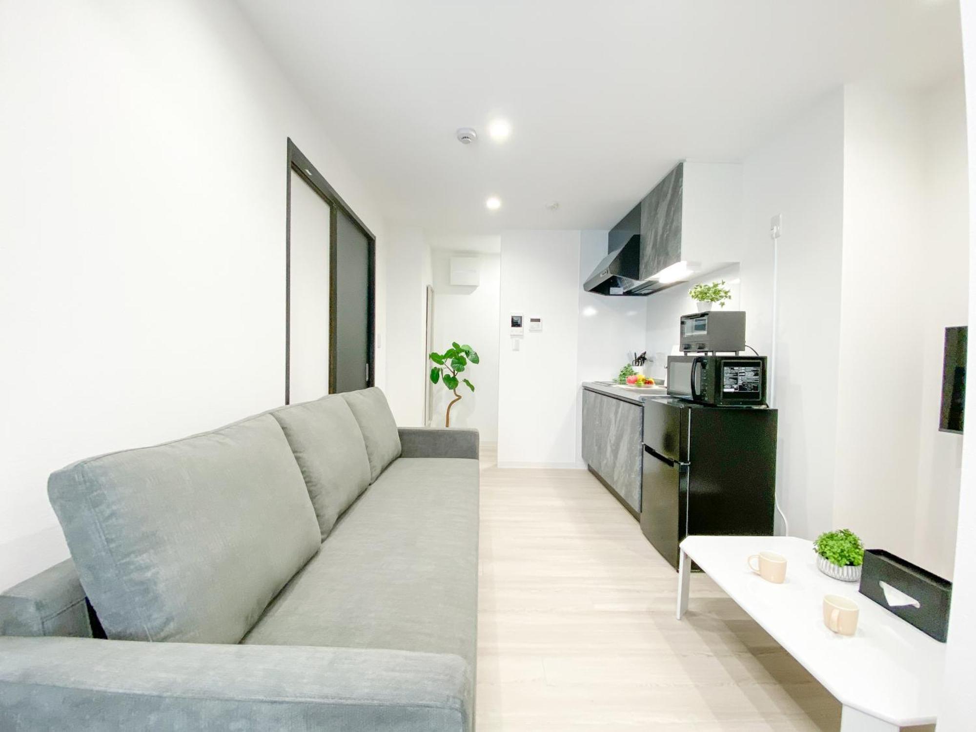 Residential Hotel Glitter Usjまで1駅5分 Osaka Cameră foto