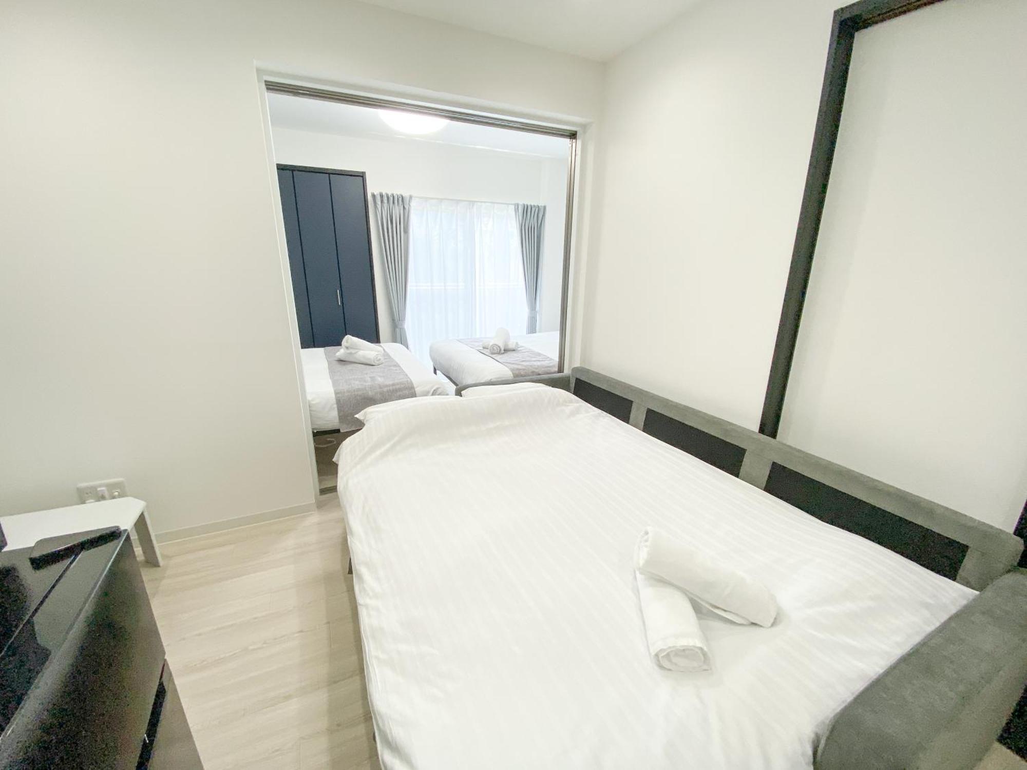 Residential Hotel Glitter Usjまで1駅5分 Osaka Cameră foto