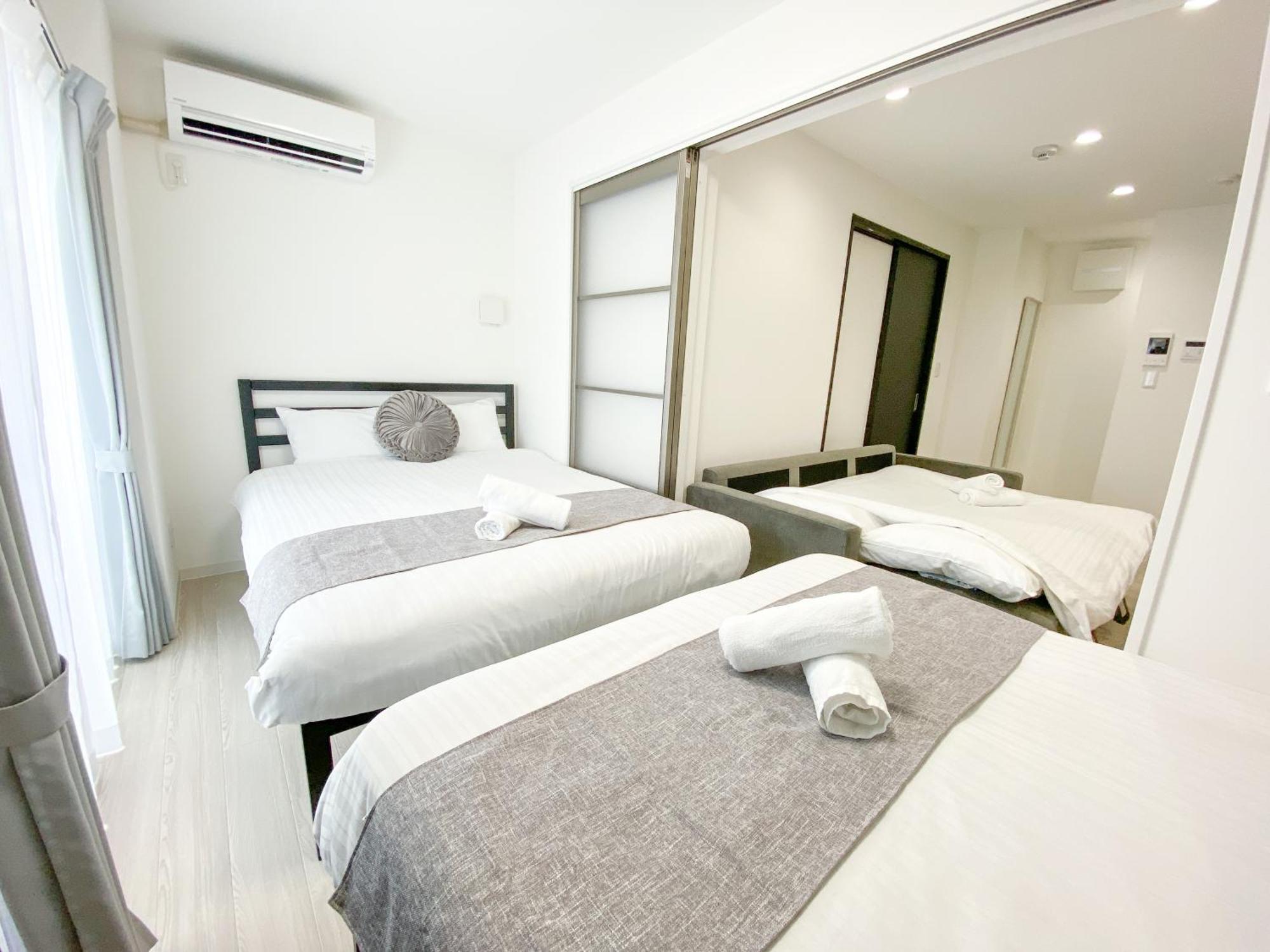 Residential Hotel Glitter Usjまで1駅5分 Osaka Cameră foto